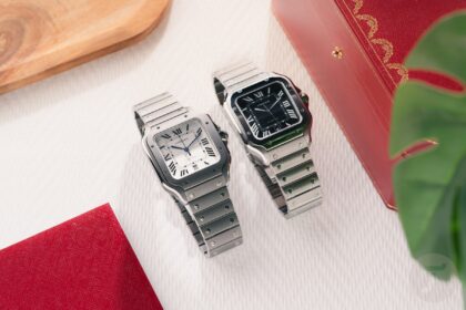 hands on two sporty new variants of the cartier santos one in titanium the other in steel with a black dial and lume 68e49f35392a1